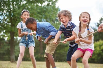 children holding a rope